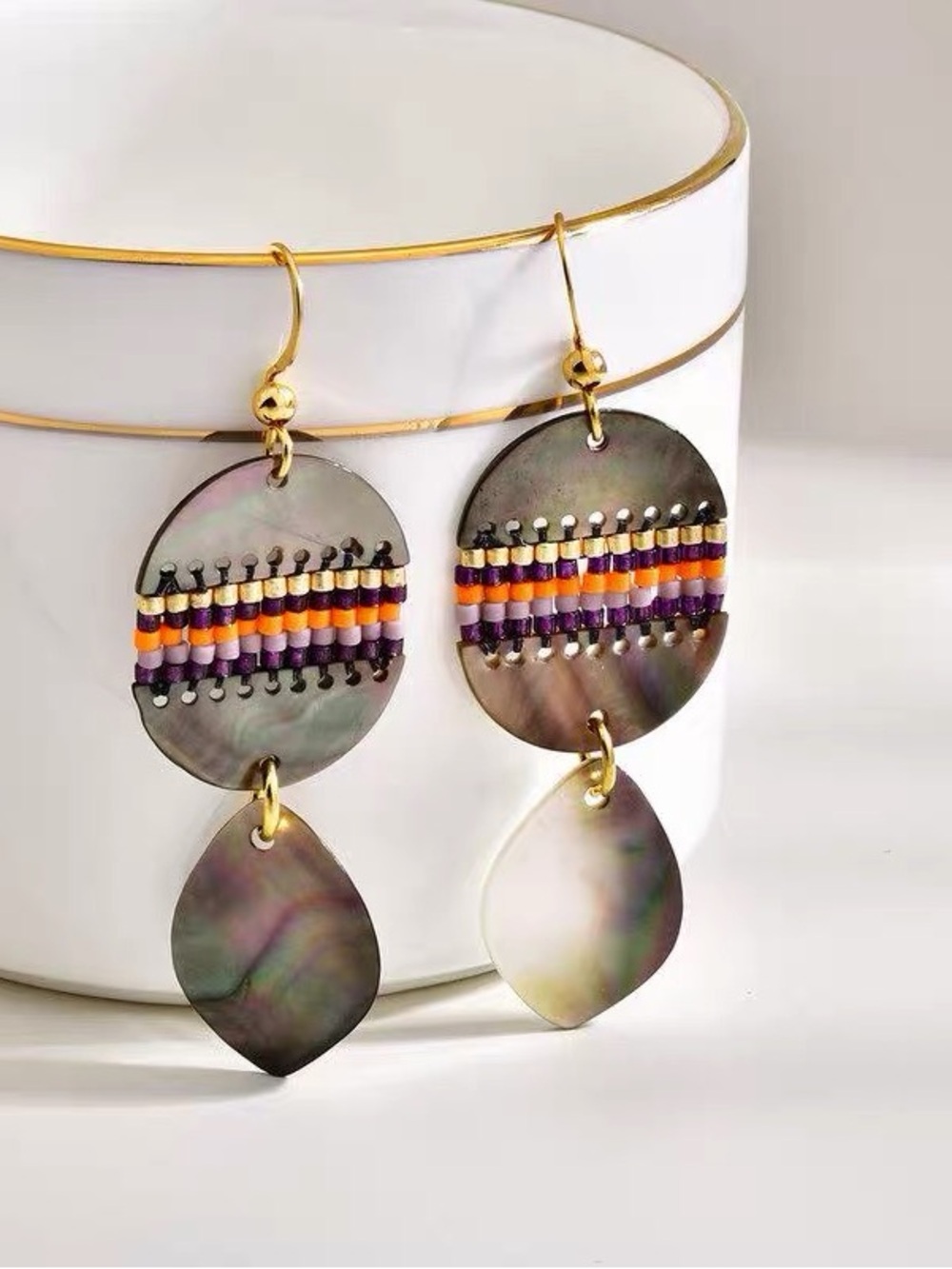 Gold-Tone Drop Earrings with Gray Shell and Purple & Orange Bead Stripes